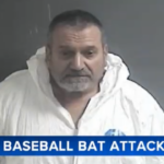 dad killed, mugshot of alleged suspect